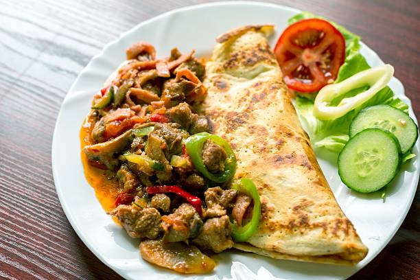 istock Delicious food on white plate 517167787