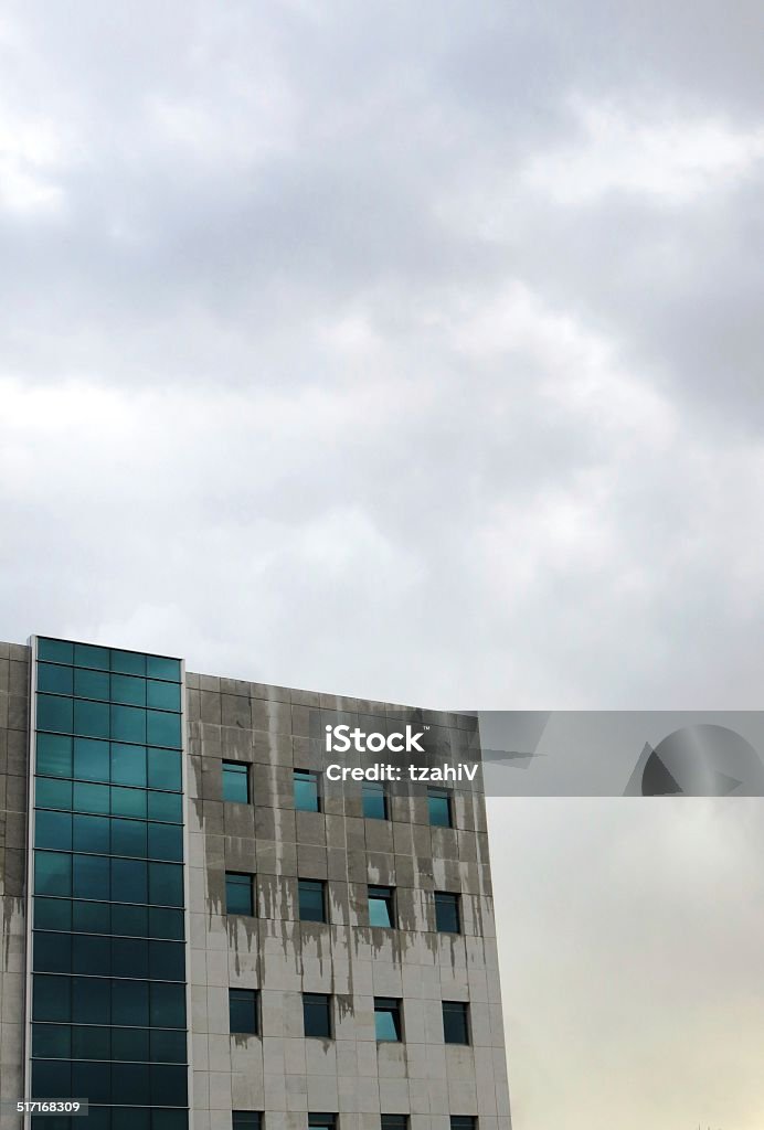 Office building New office building, begins to get wet in the rain. Accessibility Stock Photo