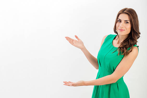 istock Business woman presenting a copyspace. 517172469