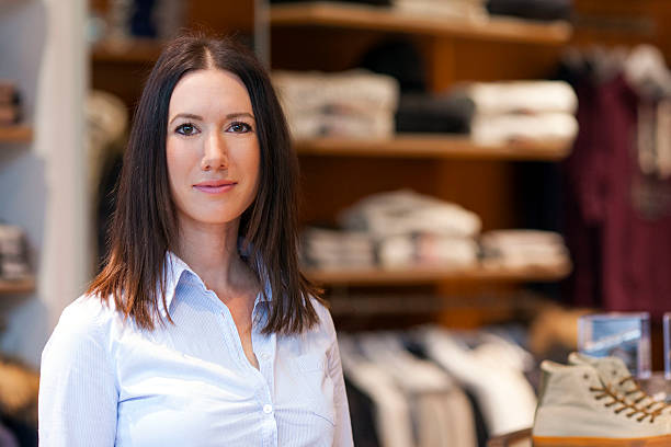 istock Young saleswoman 517173615