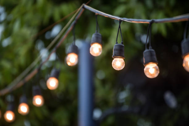 istock Hanging decorative christmas lights for a wedding ceremony 517179910