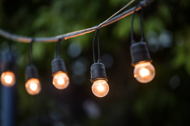 istock Hanging decorative christmas lights for a wedding ceremony 517179940