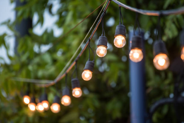 istock Hanging decorative christmas lights for a wedding ceremony 517179972