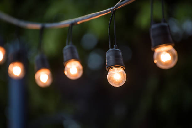 istock Hanging decorative christmas lights for a wedding ceremony 517179994