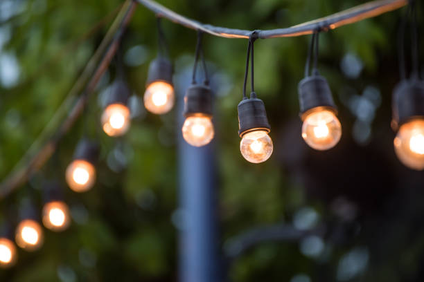 istock Hanging decorative christmas lights for a wedding ceremony 517180026