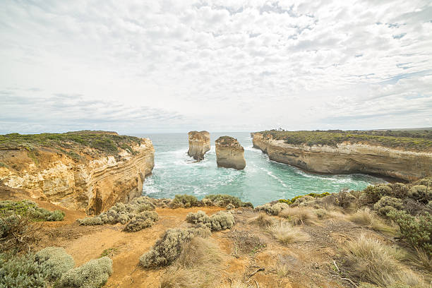 istock Great Ocean Road Limestone Cliffs and bay 517182036