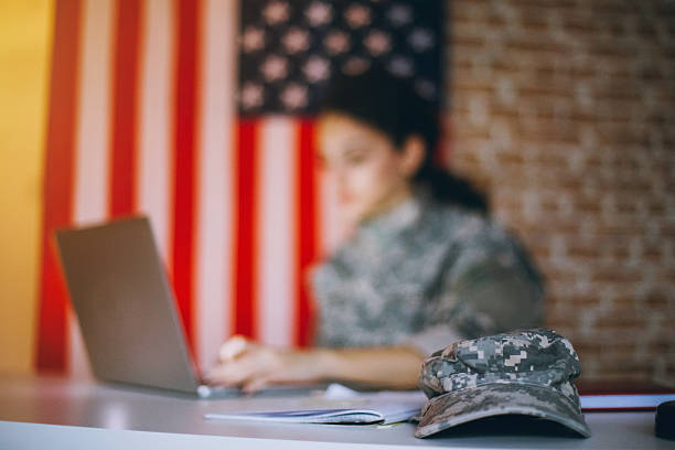istock Cap on a table of woman soldier 517182208
