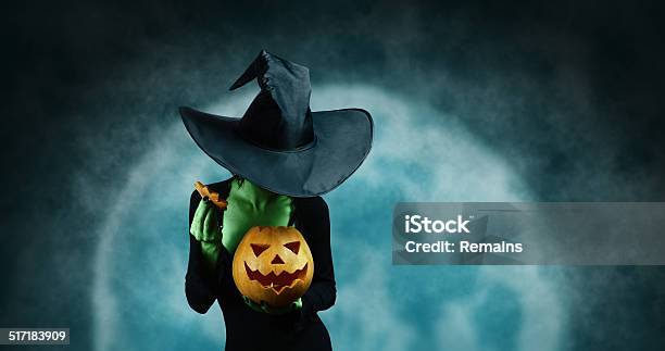 Green Witch With Pumpkin Stock Photo - Download Image Now - Halloween, Witch, Party - Social Event