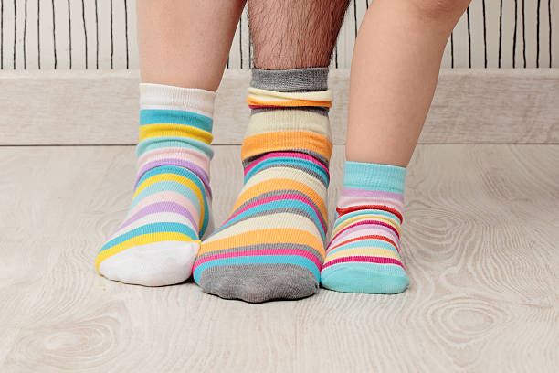 istock family in socks 517184031