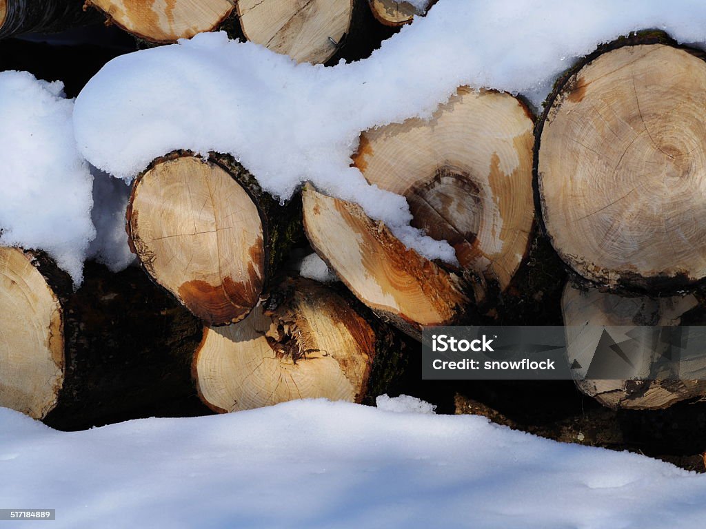 snow wood stapled wood with snow over Autumn Stock Photo