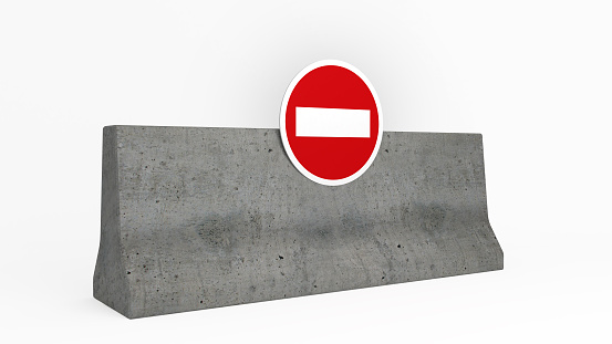 concrete barrier with no entry sign