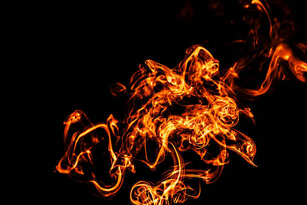 istock colorful smoke abstract on black background 517191624