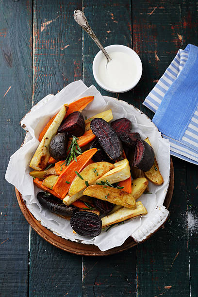 istock baked slices of spiced vegetables 517193070