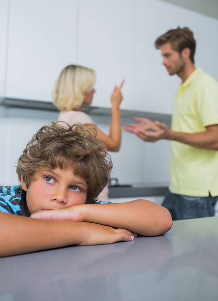 istock Parents quarreling behind son 517194399