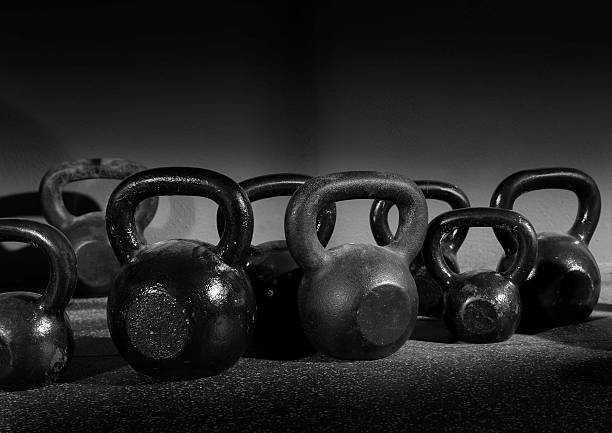 istock Kettlebells weights in a workout gym 517195165
