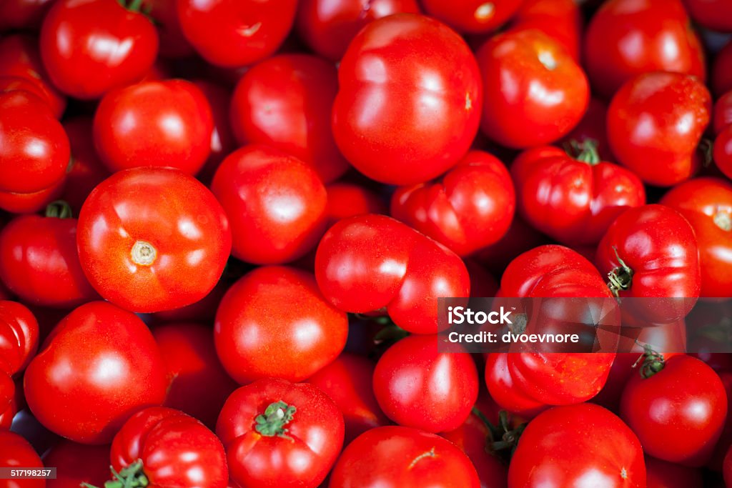 Tomatoes selling in a market Tomatoes selling in a market. Horizontal shot with selective focus Abundance Stock Photo