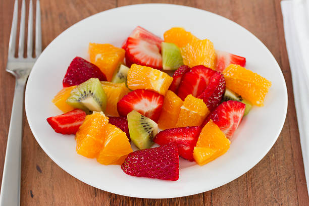 istock strawberry with kiwi and orange 517199283