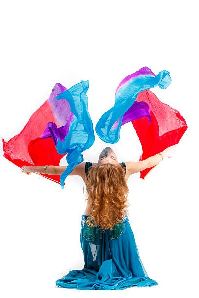 istock woman in carnival costume on white with, a fan 517201217