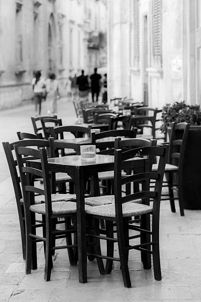 istock tables and chairs of a bar 517215249