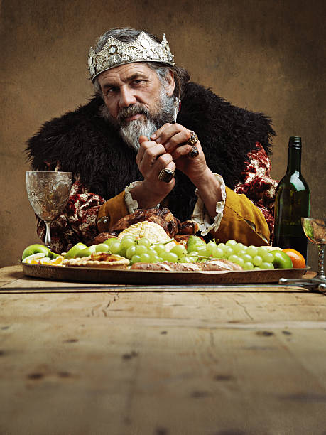 being king has its perks - medieval banquet food dinner party 뉴스 사진 이미지