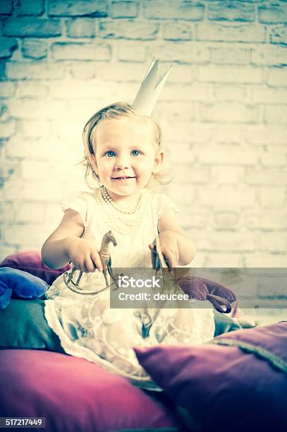 Little Princess With Old Gold Toy Stock Photo - Download Image Now - 2-3 Years, Arts Culture and Entertainment, Baby - Human Age