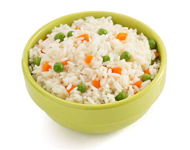 istock bowl full of rice on white 517218523