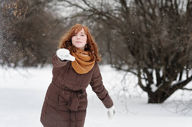 istock Young woman having fun in winter 517220391