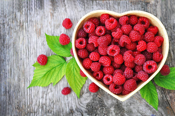 Raspberry and heart stock photo