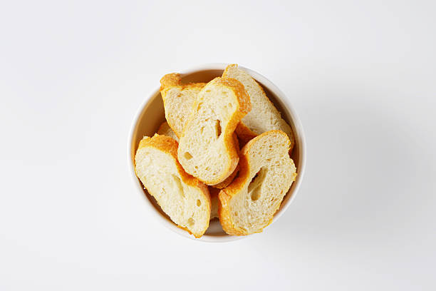 sliced French bread in white bowl