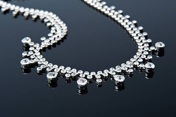 istock jewelry necklace on black background 517228518