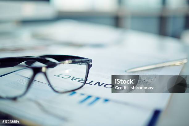 Business Contract Details Stock Photo - Download Image Now - Contract, Eyeglasses, Agreement