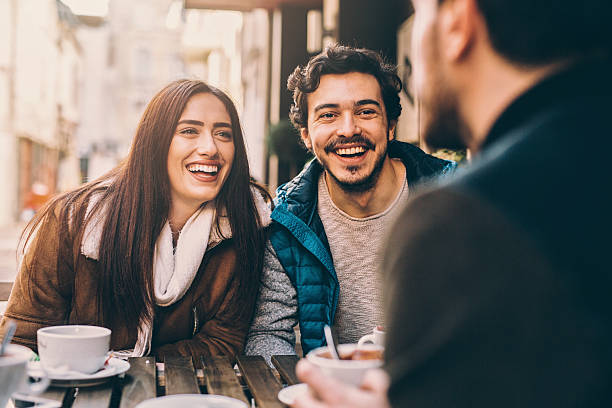istock Group of friends talking and laughing 517231210