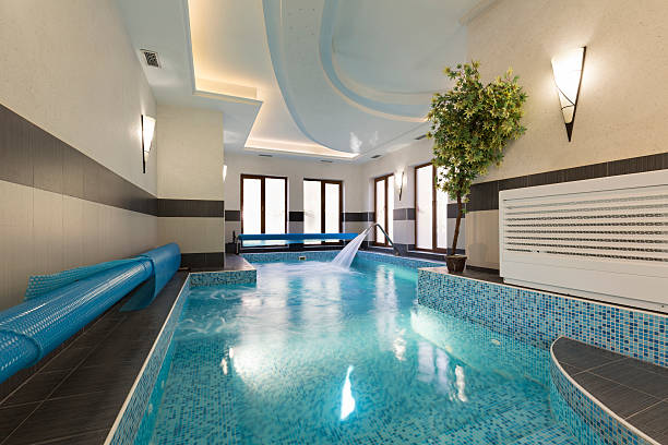 istock Indoor swimming pool at spa center 517231446
