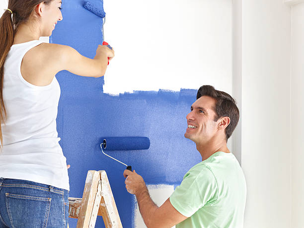 istock Couple painting wall 517231760