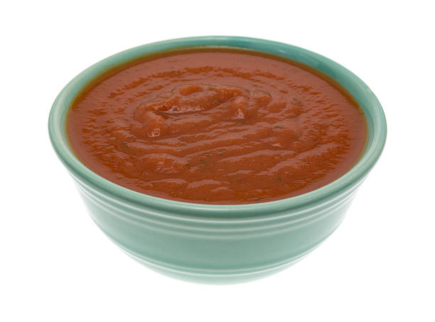 istock Bowl of spaghetti sauce on a white background. 517232142