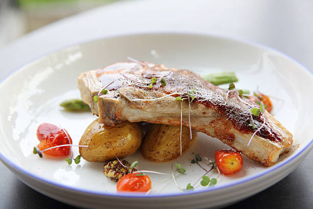 istock grilled pork chops with vegetables 517232166