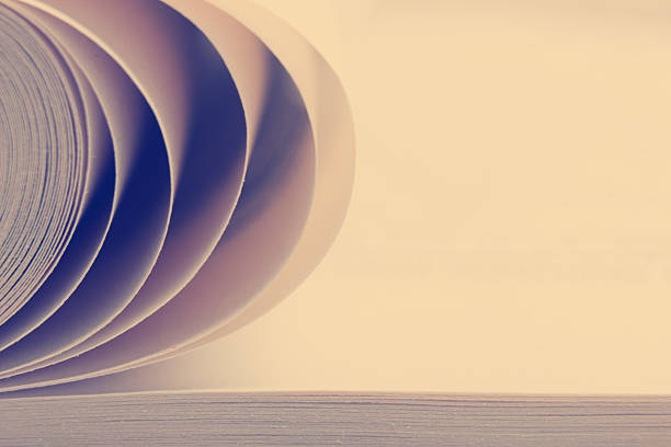 istock Macro view of book pages. Toned image. Copy space for 517232200