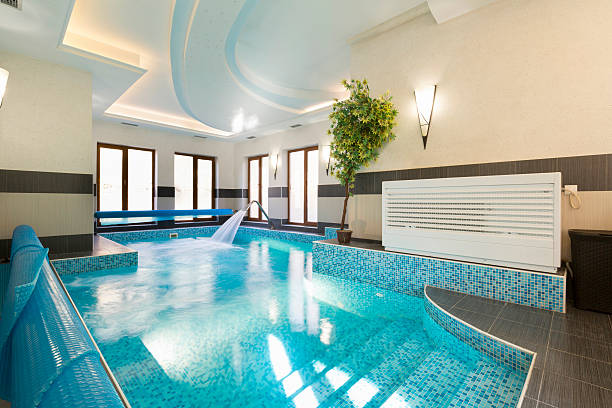 istock Indoor swimming pool at spa center 517232488