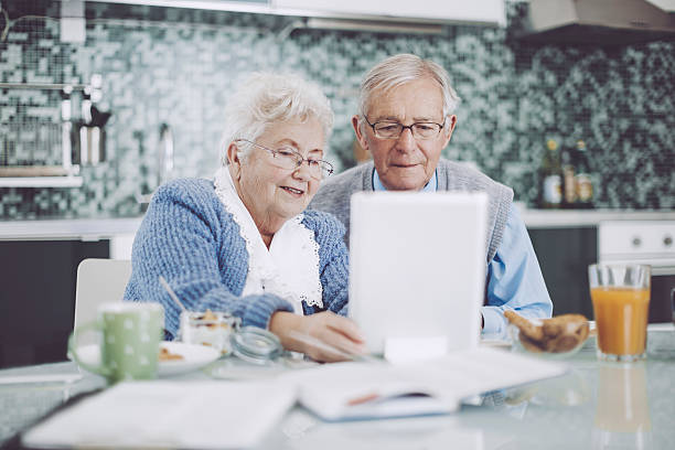 istock Senior couple having breakfast together 517232674