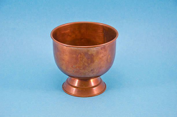 istock copper brass vase  on blue background 517234569