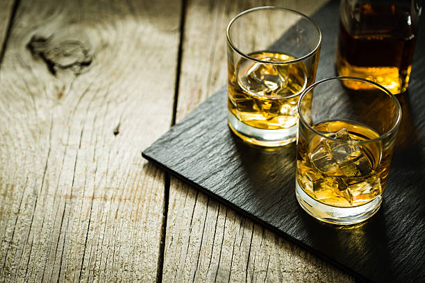 istock Whiskey with ice in glasses 517235156