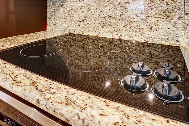 istock Modern stove with flat shiny surface. Close up view 517235169