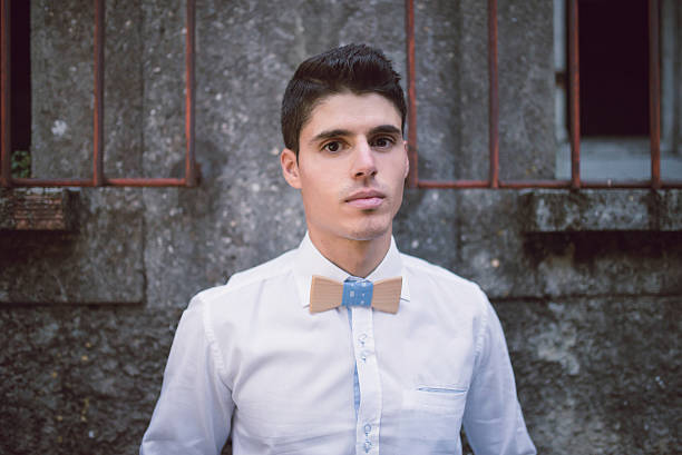 istock Portrait of an elegant man with bow tie 517235704