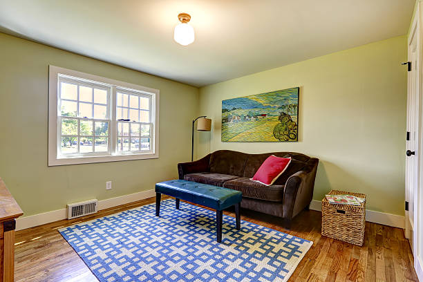 istock Simple family room with brown sofa 517237185
