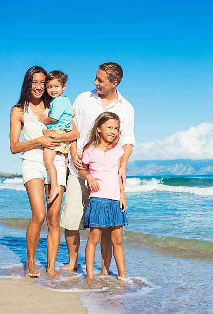 istock Happy Family on the Beach 517237271