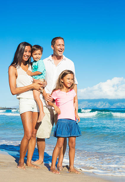 istock Happy Family on the Beach 517237281