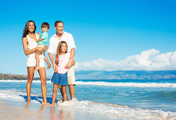 istock Happy Family on the Beach 517238243