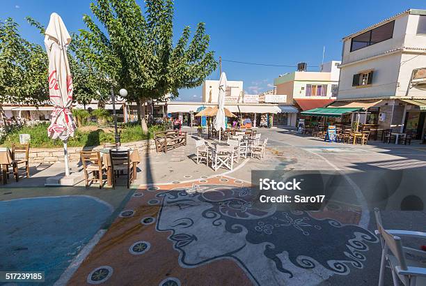 Matala Central Square Greece Stock Photo - Download Image Now - Architecture, Awning, Bar - Drink Establishment