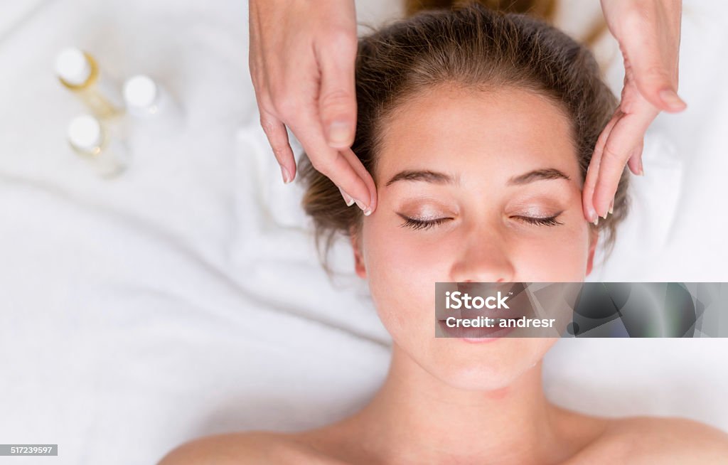 Woman at the spa Woman at the spa getting a facial - beauty concepts Facial Massage Stock Photo