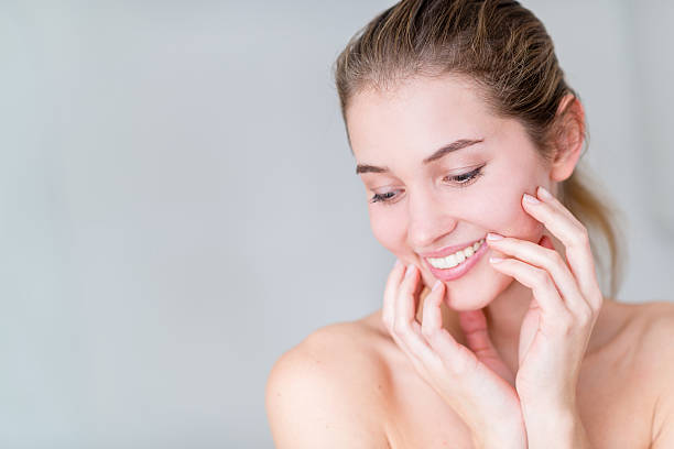 istock Young woman smiling 517239611
